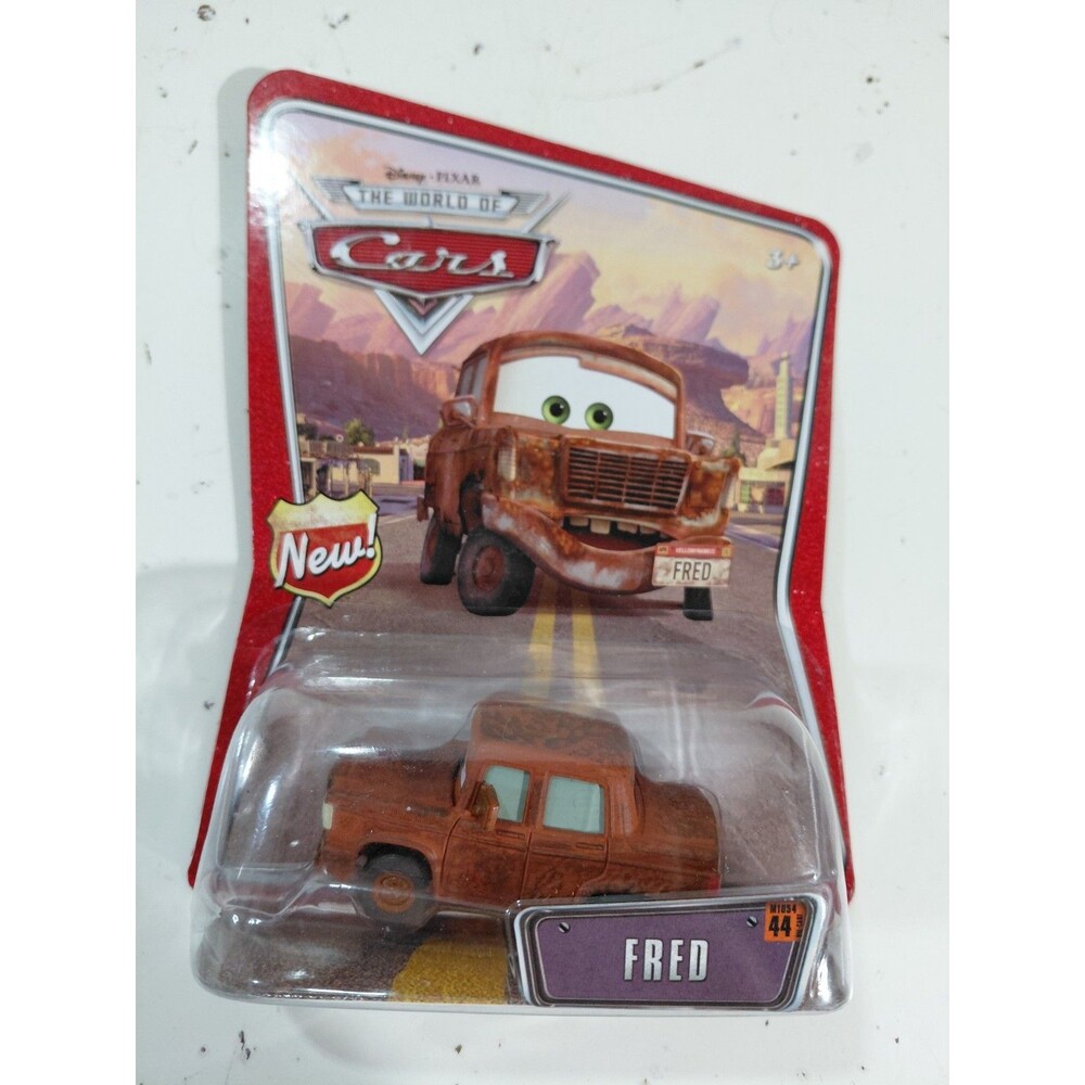 NIP Mattel 1:55 DieCast Disney World of Cars Fred Scrap Car